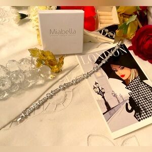 NEW WITHOUT TAGS, MIABELLA 925 STERLING SILVER CZ TENNIS BRACELET 8.5”